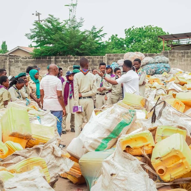 Environmental Factory
This hands-on activity culminated in a visit to an environmental factory Fulex Company Limited located in Tegeta, Dar Es Salaam where participants observed the process of transforming used plastics into raw materials, effectively connecting theoretical learning with practical application. 

During a training visit to an environmental recycling plant, young Scouts observed small pieces of plastic that had been shredded by a machine, gaining hands-on experience and understanding of the recycling process and its importance in reducing plastic waste.